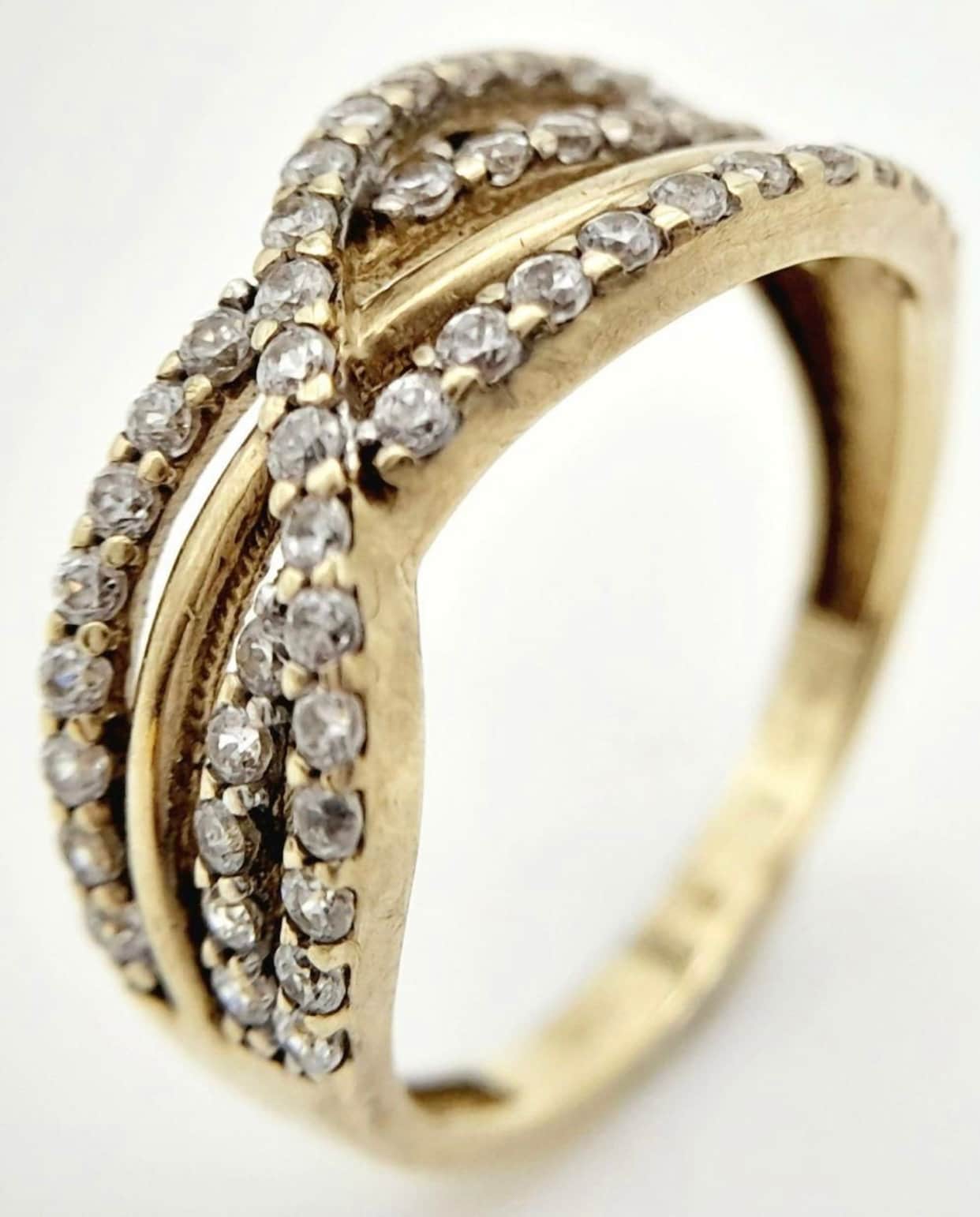 9k Gold 3 Row Crossover ring size: K 1/2